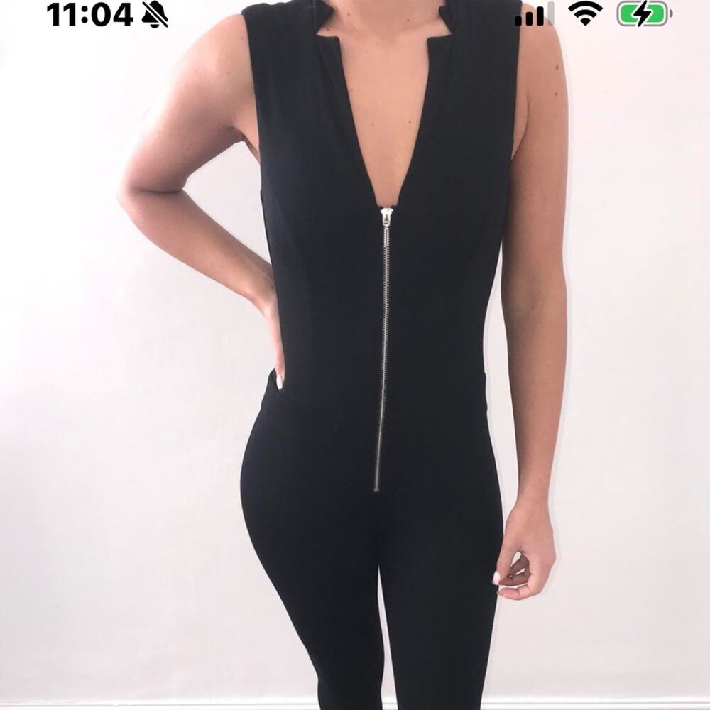 Bebe Black Sleeveless Zip Front Jumpsuit size large